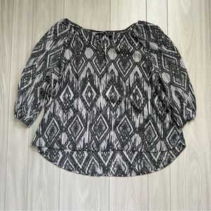 patterned gray and white blouse
